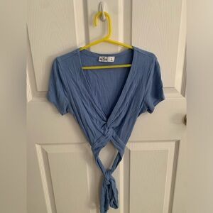 Size small, light blue wrap shirt from hollister.